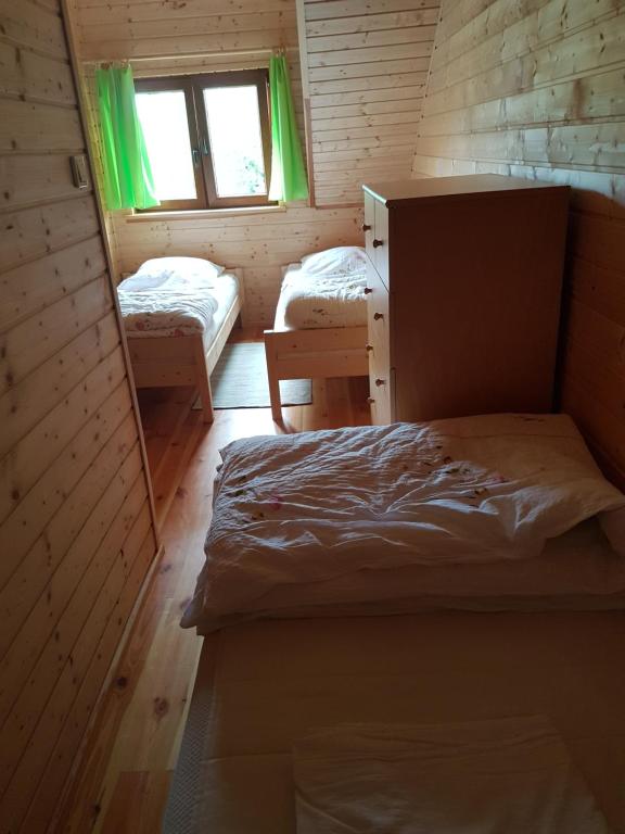 Postel nebo postele na pokoji v ubytování Cztery Pory Roku