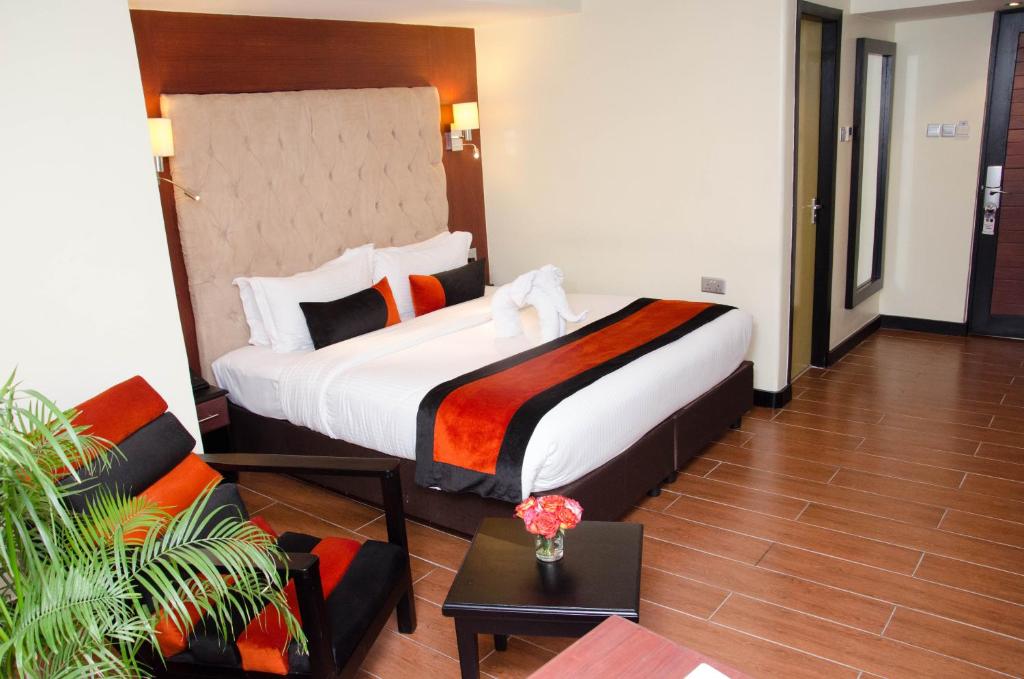 Postel nebo postele na pokoji v ubytování Best Western Plus Meridian Hotel