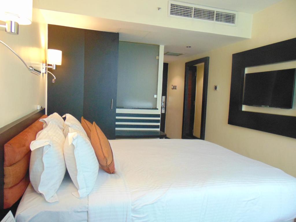 Postel nebo postele na pokoji v ubytování Best Western Plus Meridian Hotel