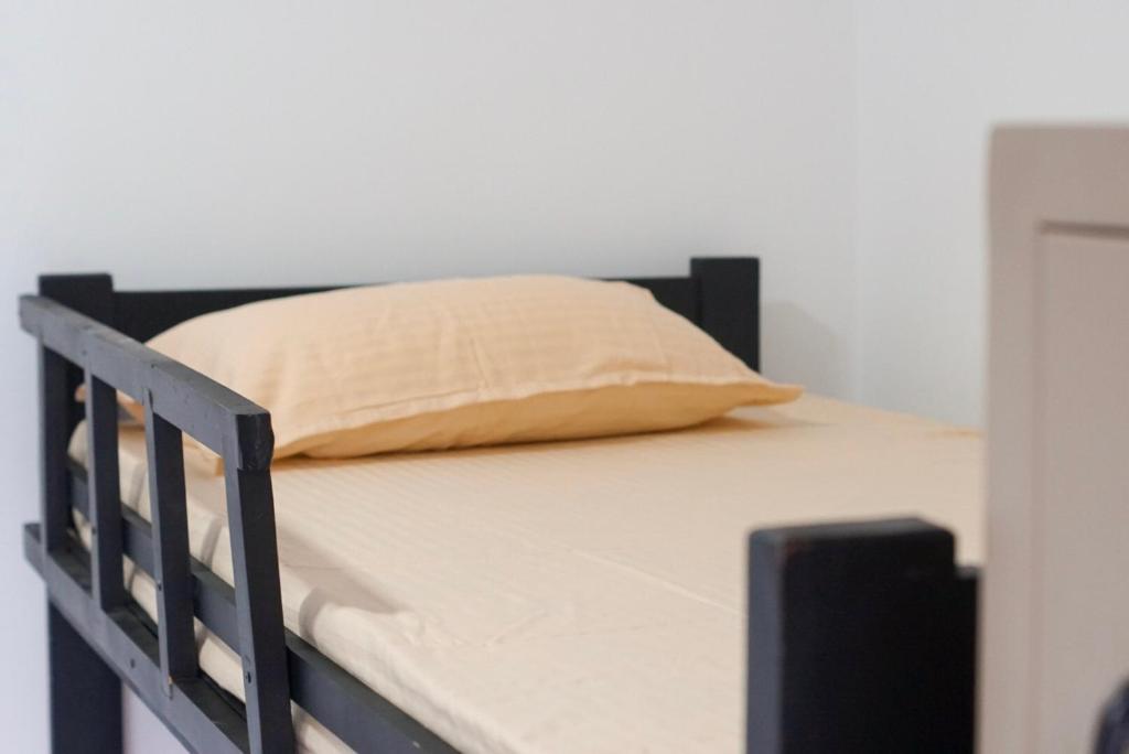 Postel nebo postele na pokoji v ubytování White Rose Hostel