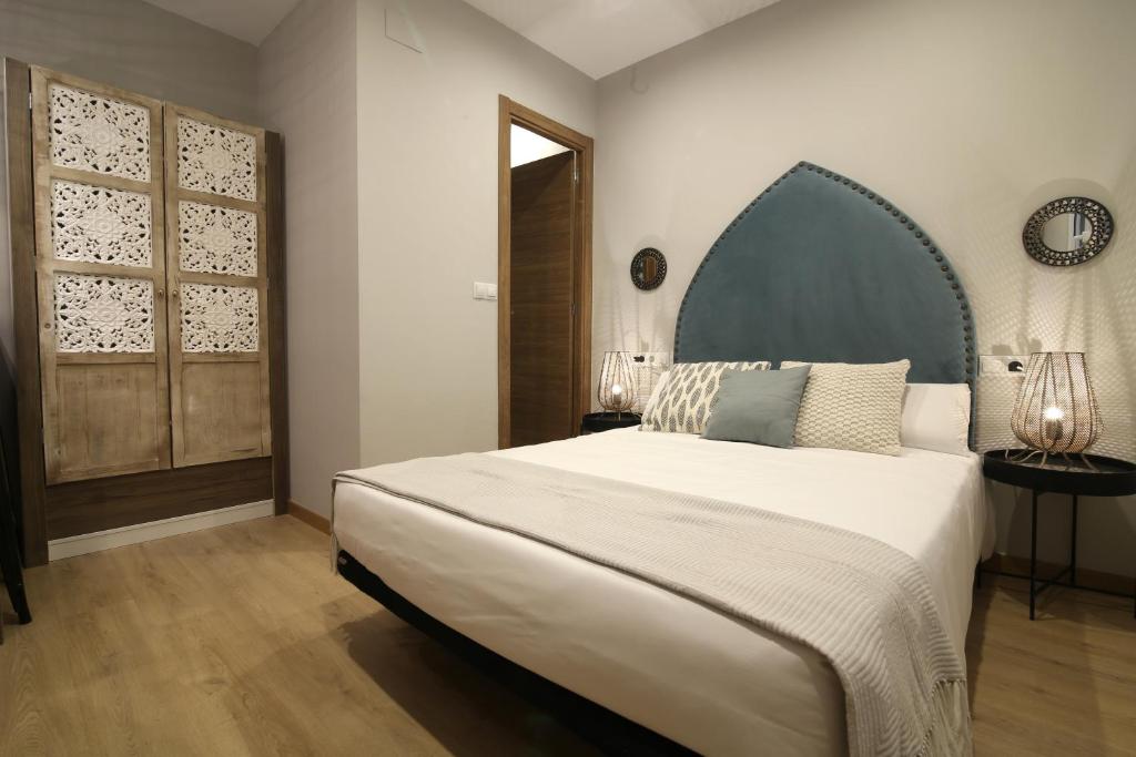 
Cama o camas de una habitación en AbraCadabra Suites
