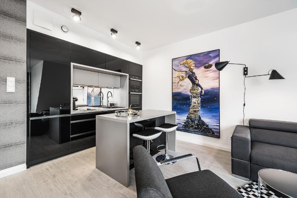 Kuchyňa alebo kuchynka v ubytovaní Elegancki Sopot