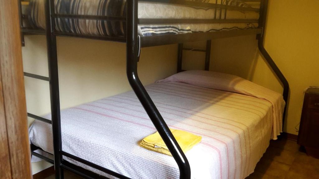 Postel nebo postele na pokoji v ubytování Gessy's