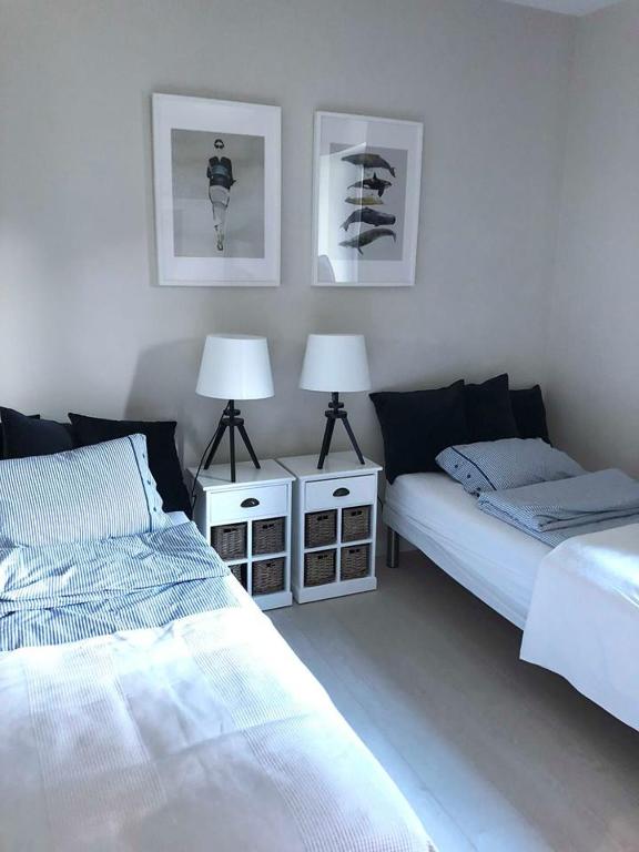 Posteľ alebo postele v izbe v ubytovaní Widok na Mazury Apartament przy Porcie