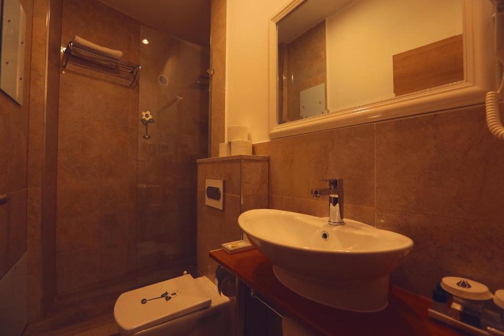 Koupelna v ubytování Hotel Pinocchio