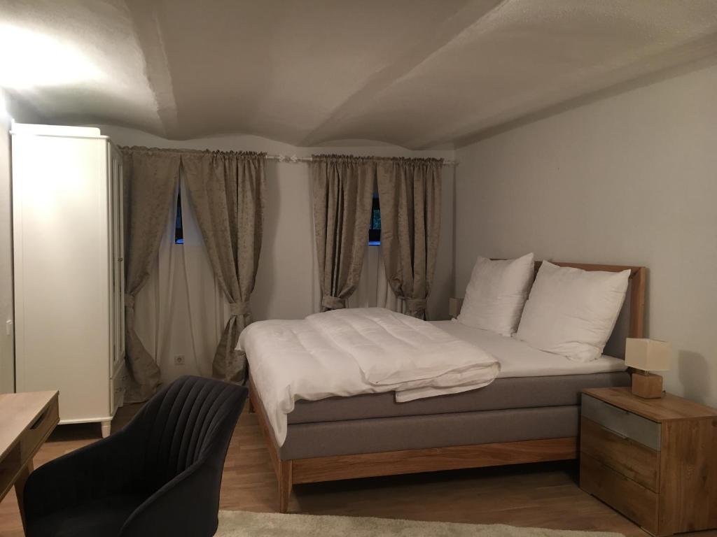 A bed or beds in a room at Naturresidenz Kropfitsch