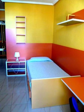 Cama o camas de una habitación en Residencia Diego Martinez