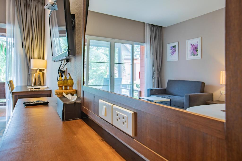 Posezení v ubytování C&N Kho Khao Beach Resort - SHA Plus