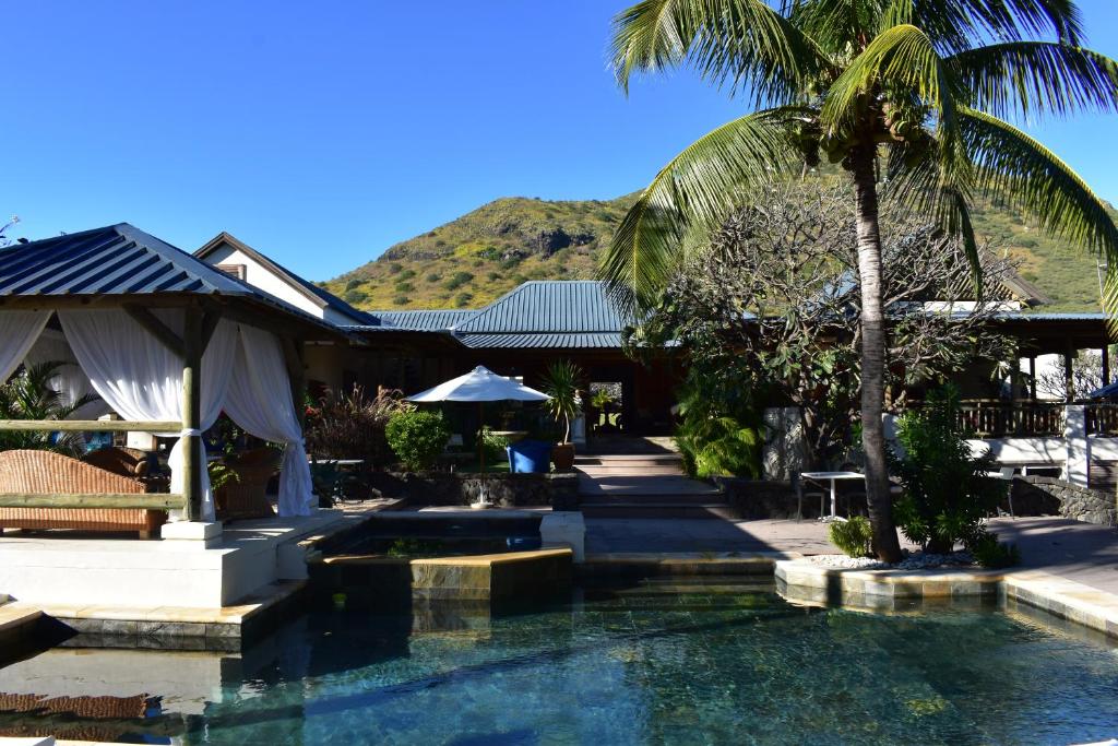 The swimming pool at or close to Shanti Ghar Guest House