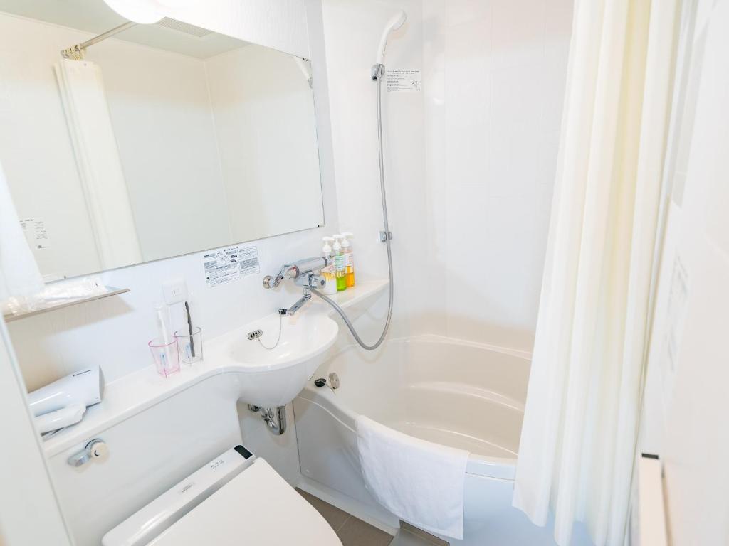 Koupelna v ubytování TABINO HOTEL Sado