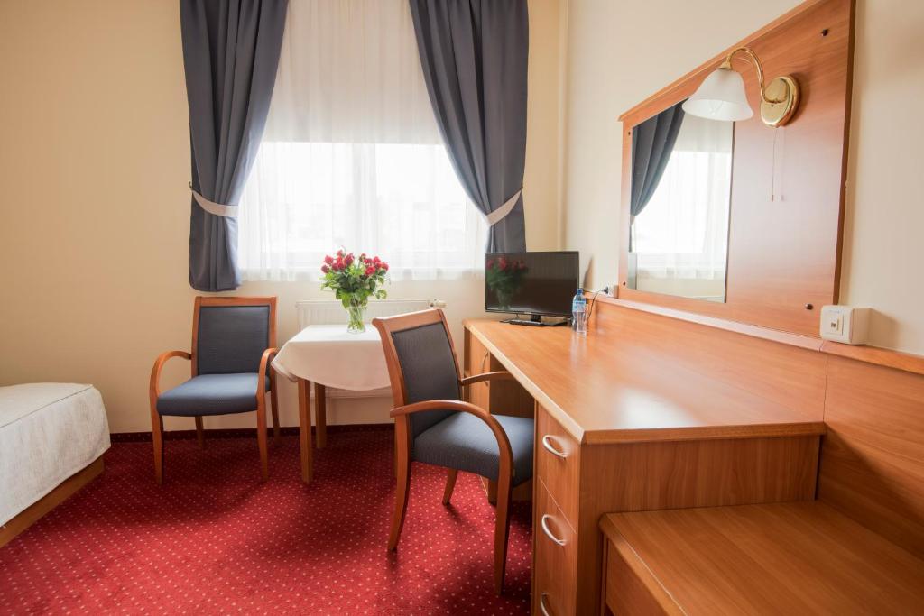TV a/nebo společenská místnost v ubytování Hotel Daria