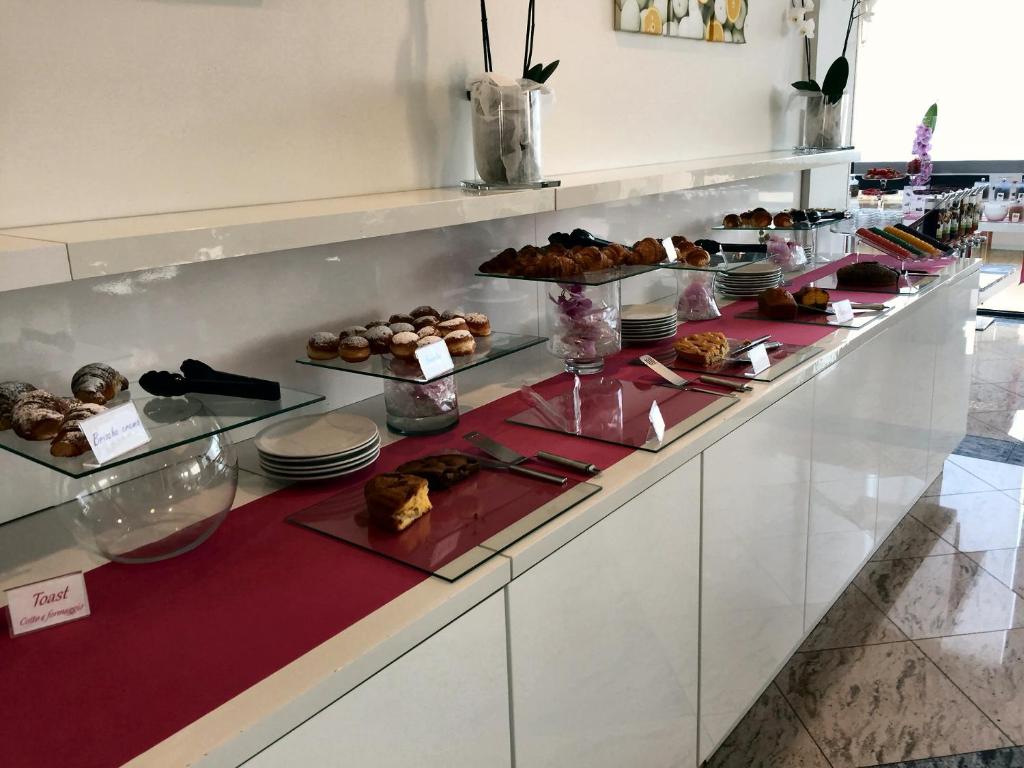 Kuchyň nebo kuchyňský kout v ubytování Hotel Byron
