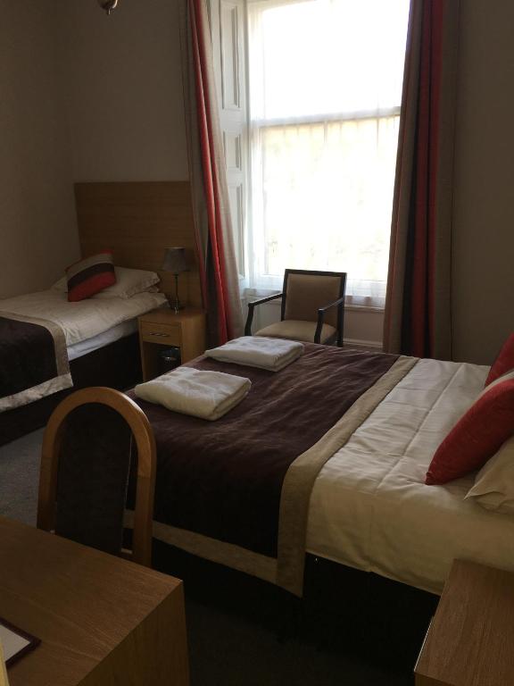 Postel nebo postele na pokoji v ubytování Belvedere Guest House