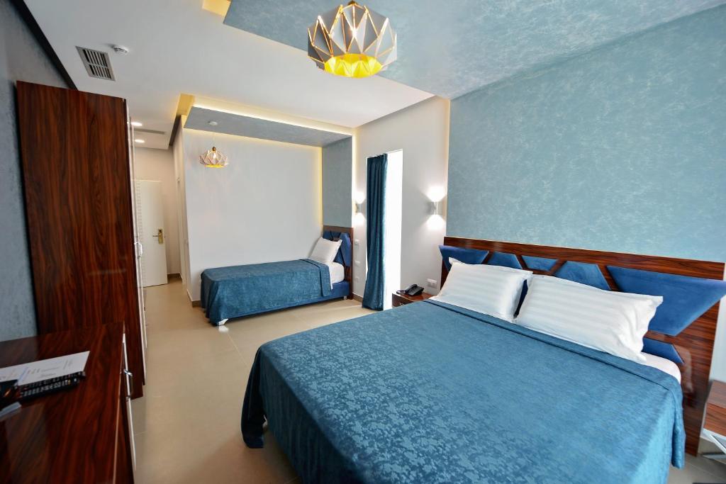 Letto o letti in una camera di Luani-A spa & wellness center