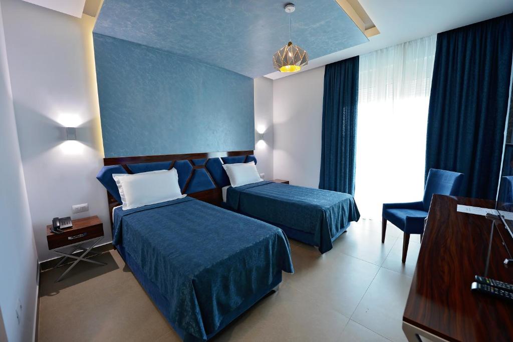 Letto o letti in una camera di Luani-A spa & wellness center