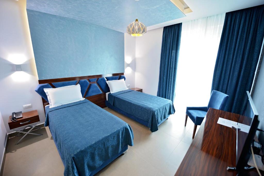 Letto o letti in una camera di Luani-A spa & wellness center