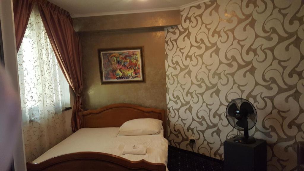 Postel nebo postele na pokoji v ubytování Hotel Kotva
