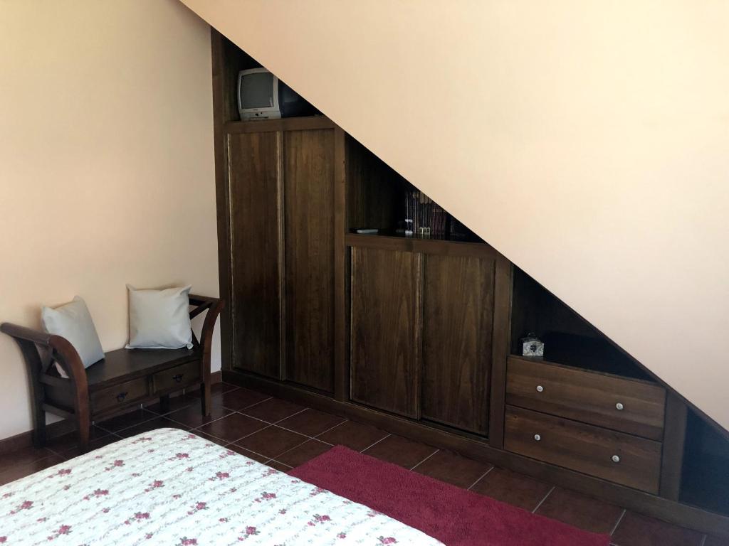 Postel nebo postele na pokoji v ubytování O Capricho