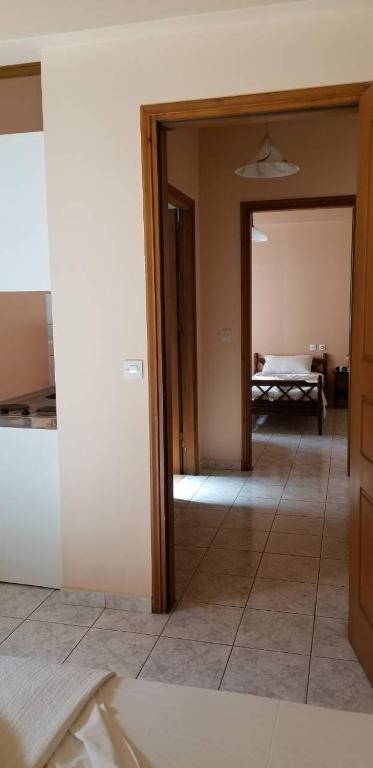 Postel nebo postele na pokoji v ubytování Filoxenia