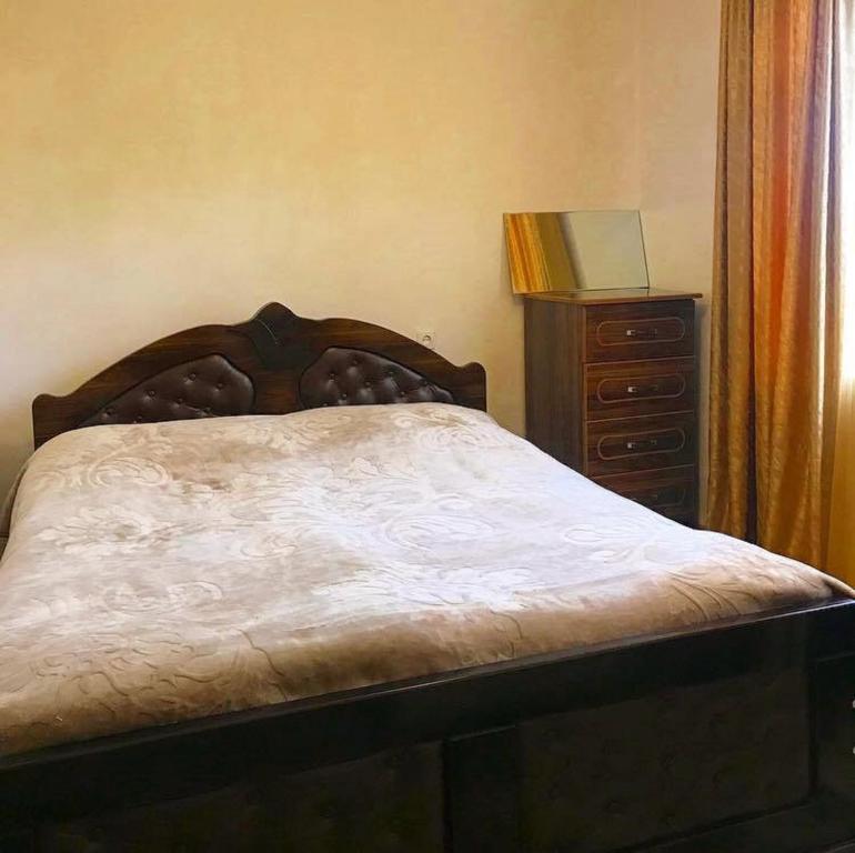 Postel nebo postele na pokoji v ubytování Guest house Racha