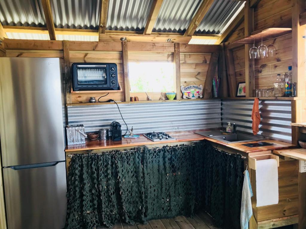 Kuchyň nebo kuchyňský kout v ubytování Bungalow de charme vue mer