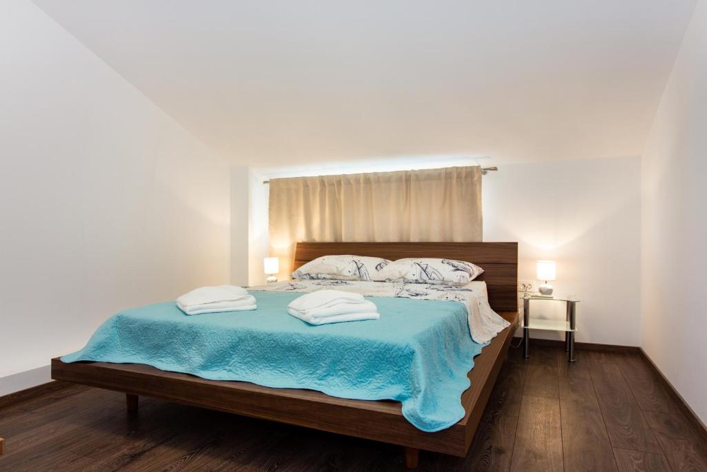 Posteľ alebo postele v izbe v ubytovaní Apartment Villa Rina- Heated salt water Pool