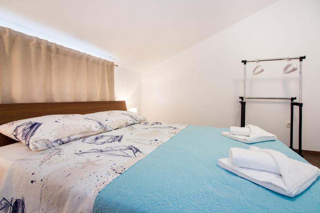 Posteľ alebo postele v izbe v ubytovaní Apartment Villa Rina- Heated salt water Pool