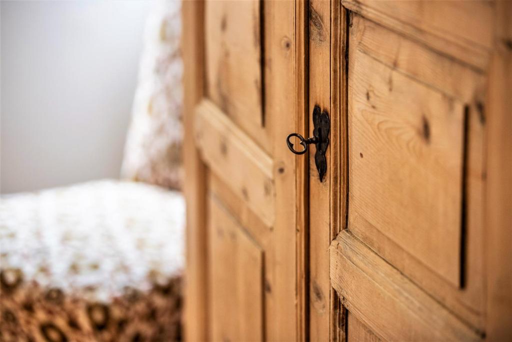 Postel nebo postele na pokoji v ubytování Hotel Münsterhof