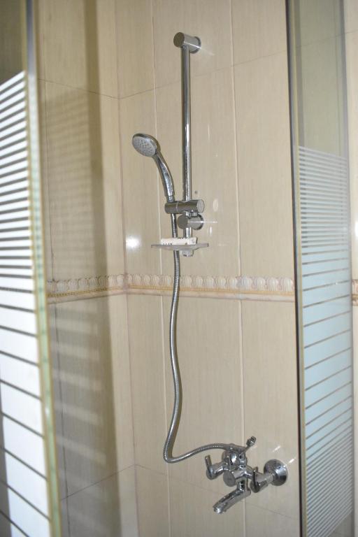 Koupelna v ubytování Cascade Hotel