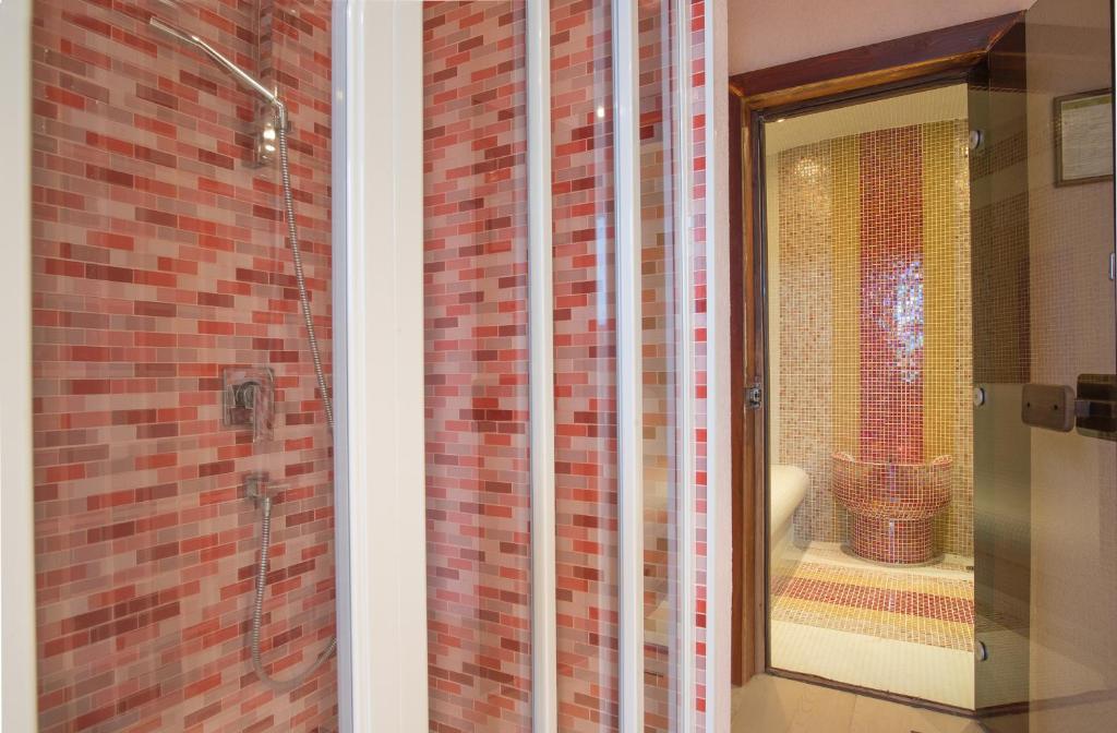 Koupelna v ubytování Boutique Hotel Uniqato