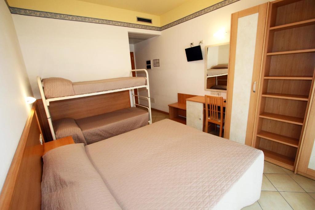 Postel nebo postele na pokoji v ubytování Hotel Boom