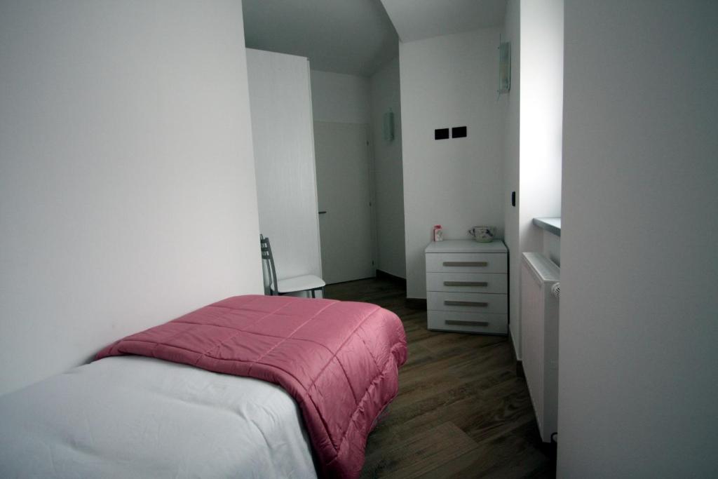 Postel nebo postele na pokoji v ubytování Casa ai Stabli