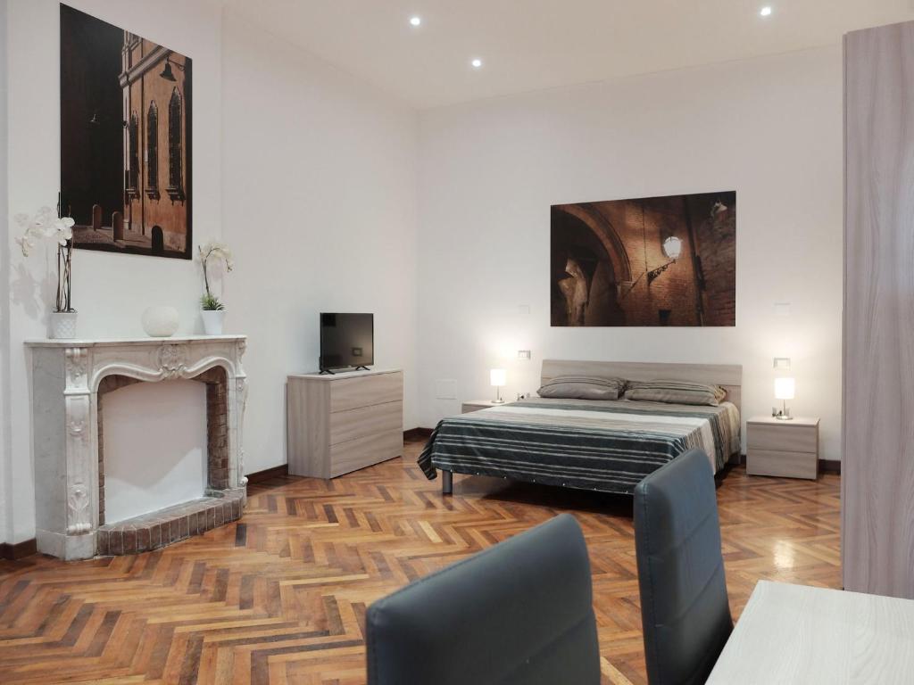 Postel nebo postele na pokoji v ubytování Centro Storico Suites
