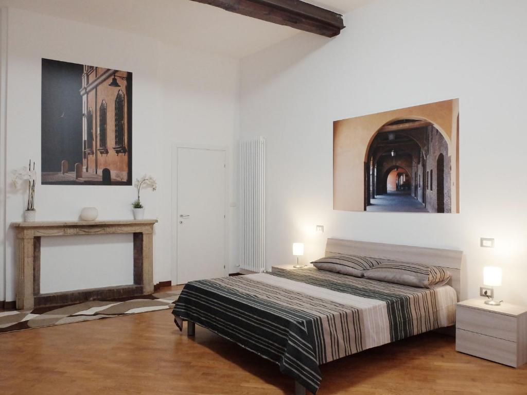 Postel nebo postele na pokoji v ubytování Centro Storico Suites