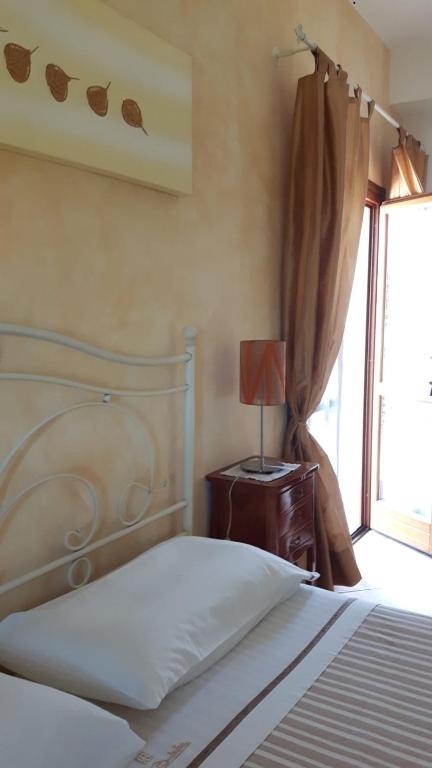 Postel nebo postele na pokoji v ubytování B&B La Casa sul Colle