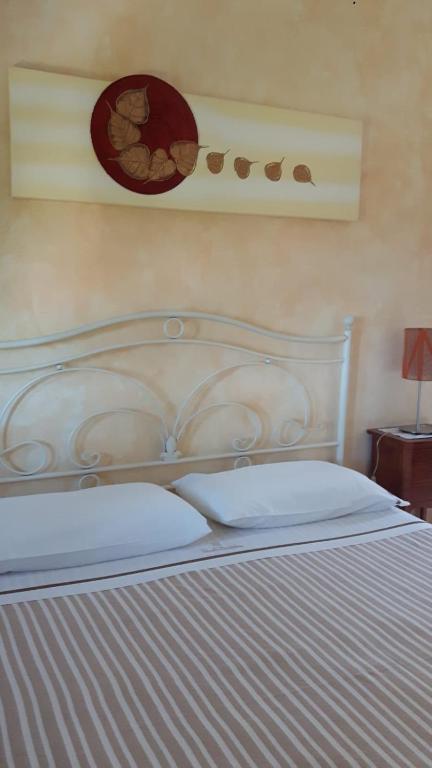 Postel nebo postele na pokoji v ubytování B&B La Casa sul Colle