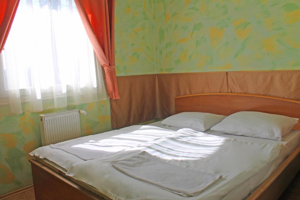 Postel nebo postele na pokoji v ubytování Motelnet.T