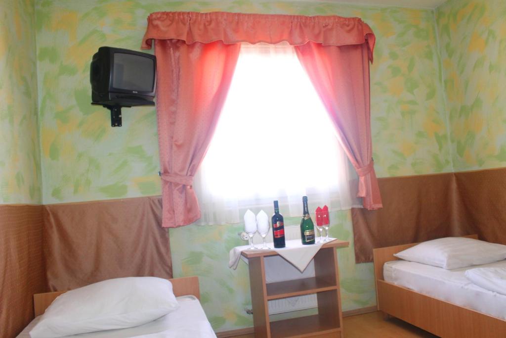 Postel nebo postele na pokoji v ubytování Motelnet.T