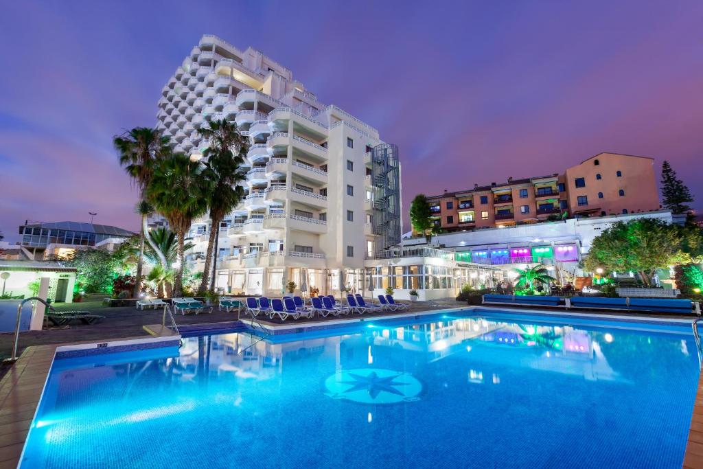 a large swimming pool in front of a building at Hotel Panoramica Garden in Los Realejos