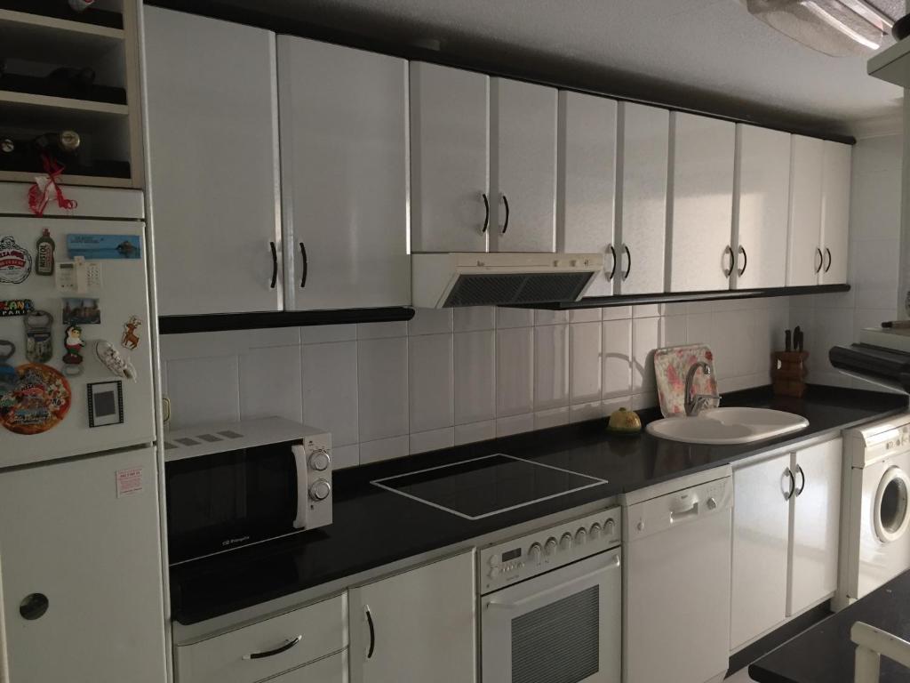 Kuchyň nebo kuchyňský kout v ubytování 1 Calle del Mar Apartamento