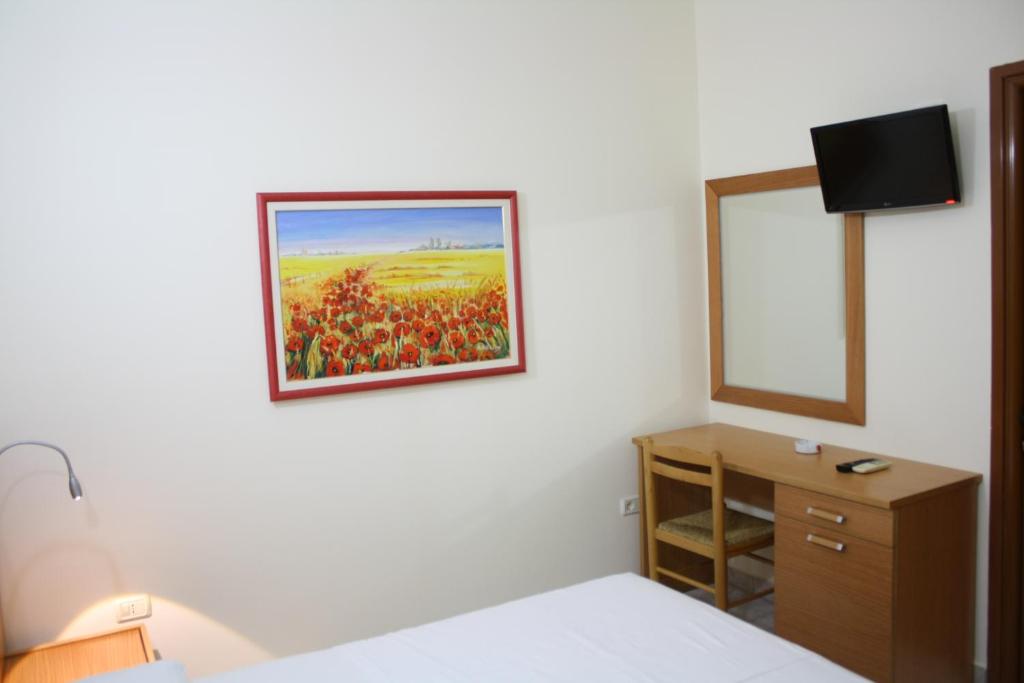 TV a/nebo společenská místnost v ubytování Hotel Martini