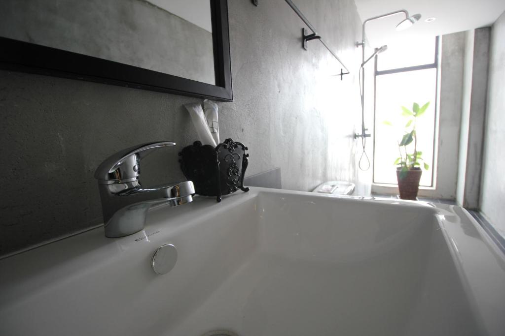 Koupelna v ubytování 68 Boutique Hotel
