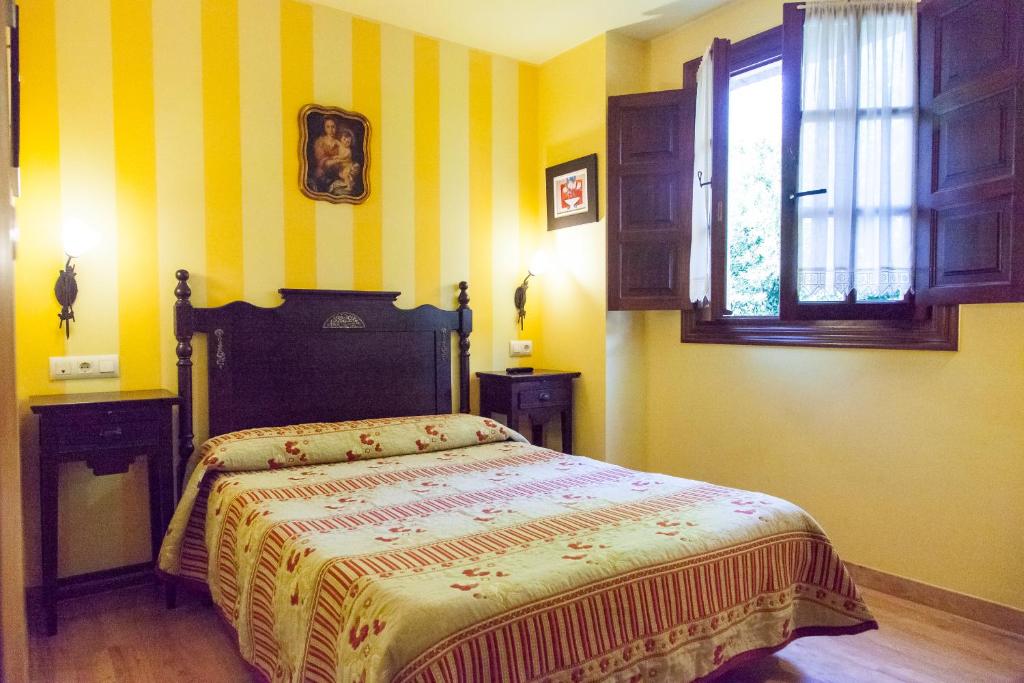 Postel nebo postele na pokoji v ubytování Hosteria Hijuelas