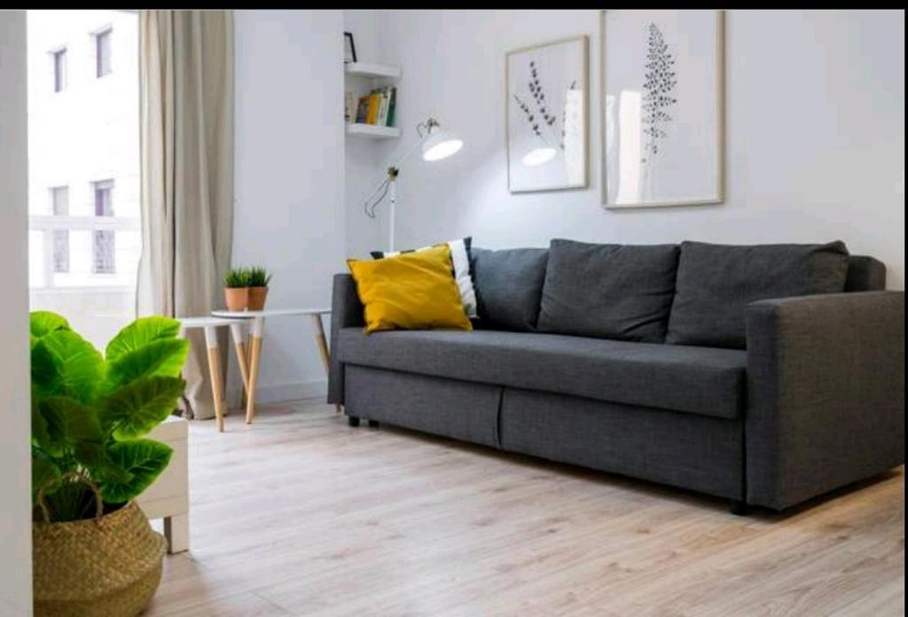 A seating area at Apartamento MINAGA 1