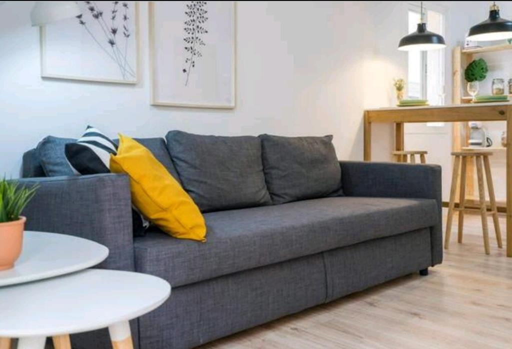 A seating area at Apartamento MINAGA 1
