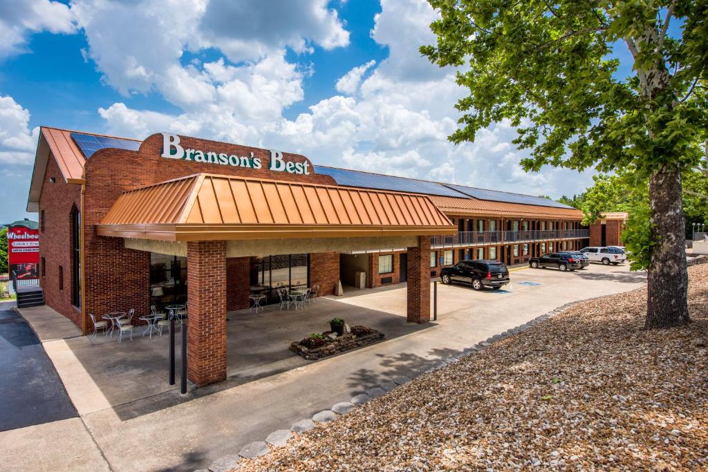 a brick building with a sign on the front of it at Branson's Best in Branson