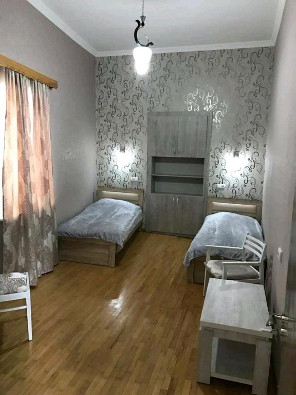 Postel nebo postele na pokoji v ubytování Guest House Keria