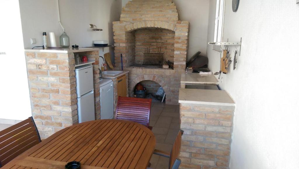 Kuchyň nebo kuchyňský kout v ubytování Holiday home Olive