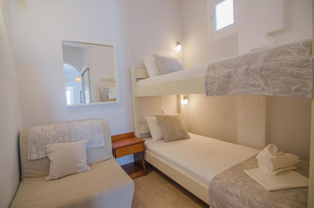 Una cama o camas en una habitación de Corali Beach Hotel