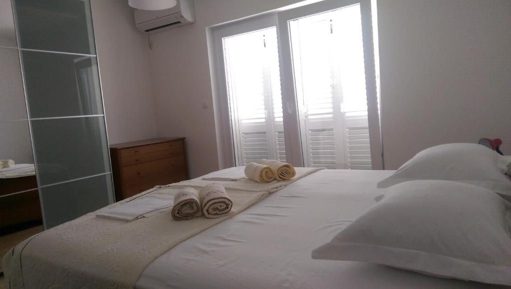Postel nebo postele na pokoji v ubytování Holiday home Olive